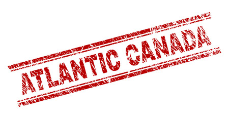 ATLANTIC CANADA seal print with grunge texture. Red vector rubber print of ATLANTIC CANADA text with retro texture. Text caption is placed between double parallel lines.のイラスト素材