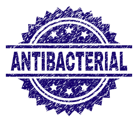 ANTIBACTERIAL stamp seal watermark with distress style. Blue vector rubber print of ANTIBACTERIAL text with retro texture.のイラスト素材