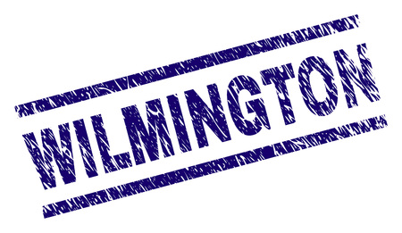 WILMINGTON seal print with grunge style. Blue vector rubber print of WILMINGTON tag with dirty texture. Text tag is placed between parallel lines.のイラスト素材
