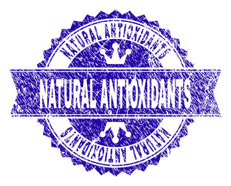 NATURAL ANTIOXIDANTS rosette stamp seal watermark with distress texture. Designed with round rosette, ribbon and small crowns.のイラスト素材