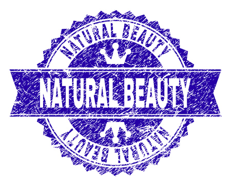 NATURAL BEAUTY rosette seal watermark with grunge style. Designed with round rosette, ribbon and small crowns. Blue vector rubber watermark of NATURAL BEAUTY label with dirty style.のイラスト素材