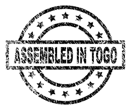 ASSEMBLED IN TOGO stamp seal watermark with distress style. Designed with rectangle, circles and stars. Black vector rubber print of ASSEMBLED IN TOGO text with retro texture.のイラスト素材