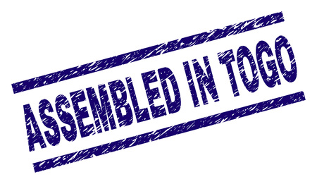 ASSEMBLED IN TOGO seal stamp with distress style. Blue vector rubber print of ASSEMBLED IN TOGO text with grunge texture. Text caption is placed between parallel lines.のイラスト素材