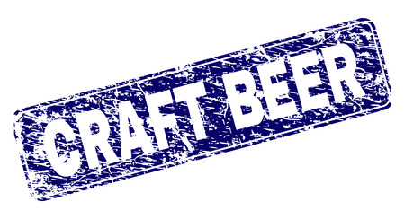 CRAFT BEER stamp seal print with grunge style. Seal shape is a rounded rectangle with frame. Blue vector rubber print of CRAFT BEER title with scratched style.のイラスト素材
