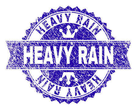 HEAVY RAIN rosette stamp overlay with grunge style. Designed with round rosette, ribbon and small crowns. Blue vector rubber print of HEAVY RAIN tag with grunge style.のイラスト素材