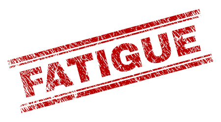 FATIGUE seal print with distress texture. Red vector rubber print of FATIGUE tag with dust texture. Text caption is placed between double parallel lines.のイラスト素材