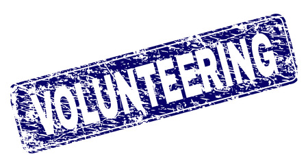 VOLUNTEERING stamp seal print with grunge texture. Seal shape is a rounded rectangle with frame. Blue vector rubber print of VOLUNTEERING tag with scratched texture.のイラスト素材