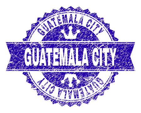 GUATEMALA CITY rosette stamp watermark with grunge style. Designed with round rosette, ribbon and small crowns. Blue vector rubber watermark of GUATEMALA CITY label with dust style.のイラスト素材