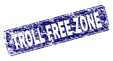 TROLL FREE ZONE stamp seal print with distress style. Seal shape is a rounded rectangle with frame. Blue vector rubber print of TROLL FREE ZONE text with corroded style.のイラスト素材