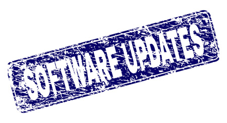 SOFTWARE UPDATES stamp seal print with grunge style. Seal shape is a rounded rectangle with frame. Blue vector rubber print of SOFTWARE UPDATES caption with scratched style.のイラスト素材