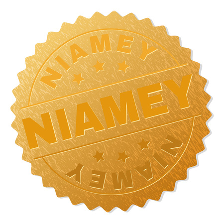 NIAMEY gold stamp badge. Vector golden medal with NIAMEY text. Text labels are placed between parallel lines and on circle. Golden skin has metallic texture.のイラスト素材