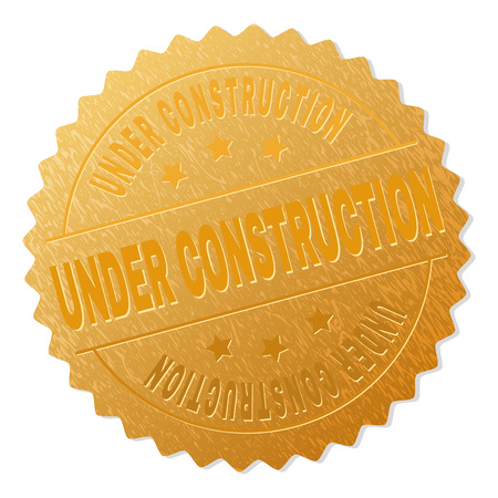 UNDER CONSTRUCTION gold stamp medallion. Vector gold award with UNDER CONSTRUCTION text. Text labels are placed between parallel lines and on circle. Golden area has metallic effect.のイラスト素材