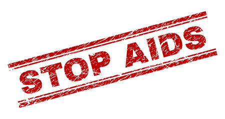 STOP AIDS seal stamp with corroded texture. Red vector rubber print of STOP AIDS text with unclean texture. Text title is placed between double parallel lines.のイラスト素材