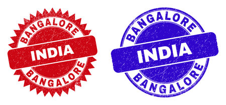 Round and rosette BANGALORE INDIA watermarks. Flat vector distress watermarks with BANGALORE INDIA text inside round and sharp rosette form, in red and blue colors. Imprints with grunge style,のイラスト素材