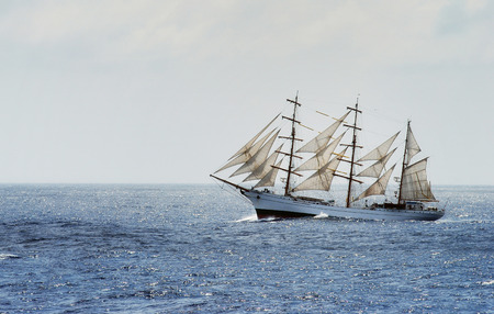 Traditional sailing ship cross from Mediterranean sea to Atlantic ocean during rough sea and strong wind.の写真素材