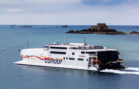 Saint-Malo, Brittany, France - May 31, 2018: The ferry leaves the bay Saint-Malo.のeditorial素材