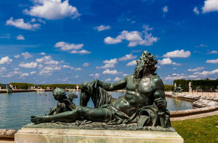 Versailles, Yvelines, Ile-de-France, France - June 3, 2018: Statue of La Loire - one of the nymphs at water parterre in Versailles.のeditorial素材