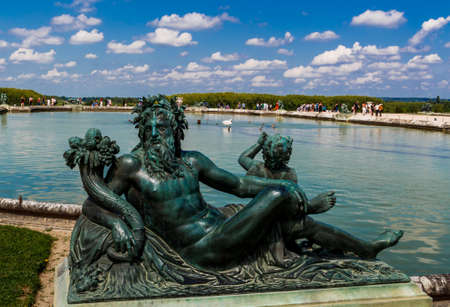 Versailles, Yvelines, Ile-de-France, France - June 3, 2018: Statue of La Dordogne - one of the nymphs at water parterre in Versailles.のeditorial素材