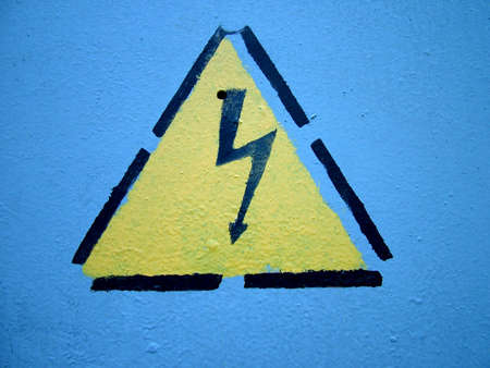 Painted warning signs on a wallの写真素材