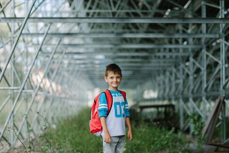 Happy student looking forward to his first day at schoolの写真素材
