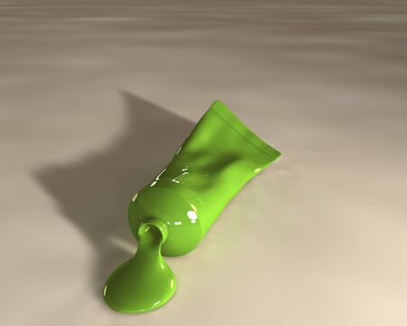 Consequential on the table surface paint from a tube of greenの写真素材