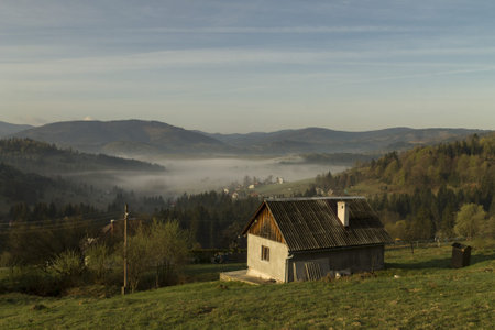 Morning fog in the mountains in Southern Polandの写真素材