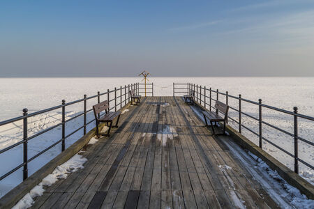 Frozen pier on the Gulf of Gdansk - Baltic Seaの写真素材
