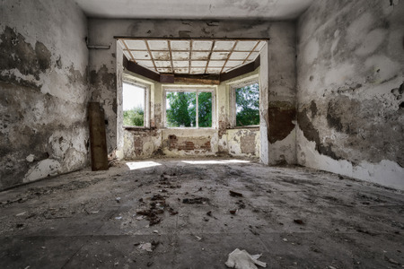 Empty destroyed room in an abandoned factoryの写真素材