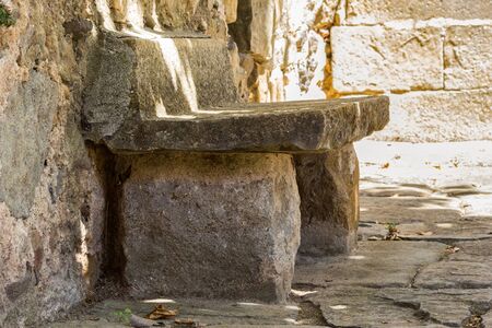 Old stone bench in Spainの写真素材