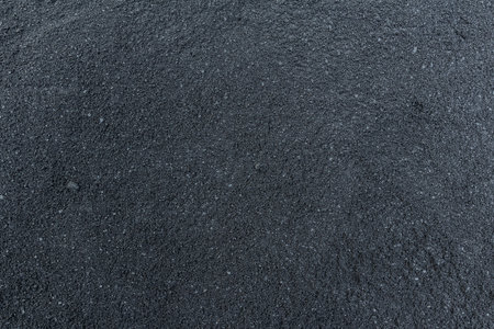 Hot blacktop concrete on road surface not under compression yet