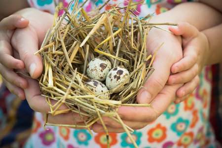 Adult and child are holding nest in palms