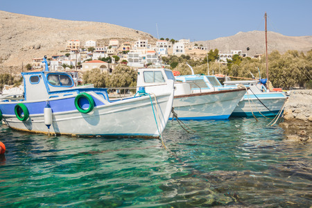 Fishing boats are floating on Greek island Kalymnosの写真素材