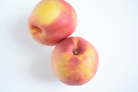Fresh peaches on white backgroundの写真素材