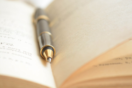 A pen in bookの写真素材