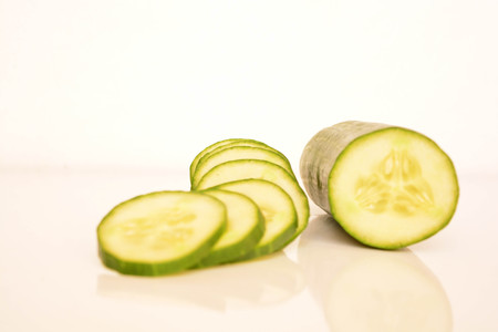 Fresh sliced cucumbersの写真素材