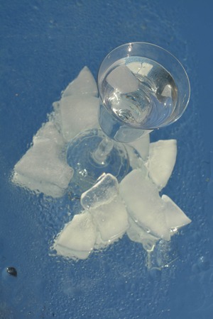 Ice cubes and a cupの写真素材