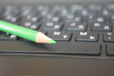 Pencil on keyboardの写真素材