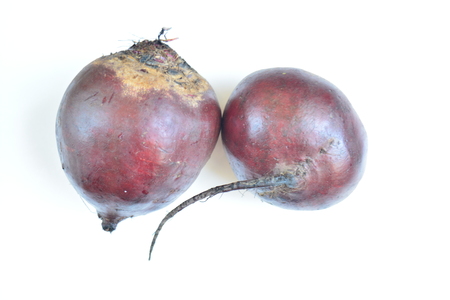 Two fresh red beets on white background, vegetablesの写真素材