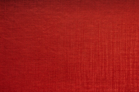 Red textured paper fabric texture backgroundの写真素材
