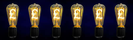The sign of the world currency is inside of the retro lamps.の写真素材