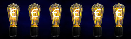 The sign of the world currency is inside of the retro lamps.の写真素材