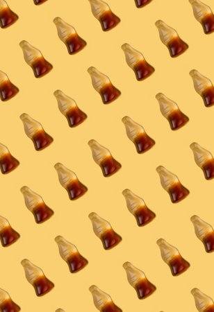 Cola jelly pattern  on yellow background , candyの写真素材