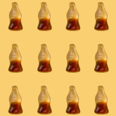 Cola jelly pattern  on yellow background , candyの写真素材
