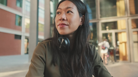Young woman freelancer in headphones