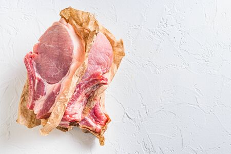 Raw organic bio Pork Belly grill. from above view on white stone background horizontal. Copyspaceの写真素材