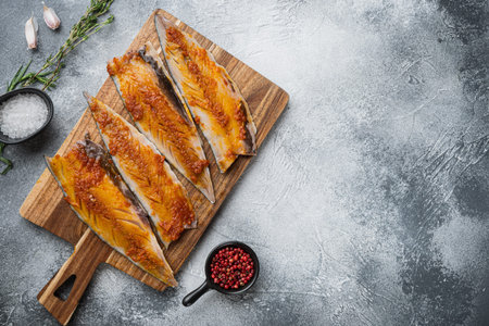 Marinated mackerel with paprika and saffron on grey background, flat lay with space for text