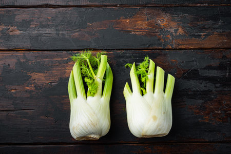 Fennel bulbs, on old wooden table, top view with space for textの写真素材