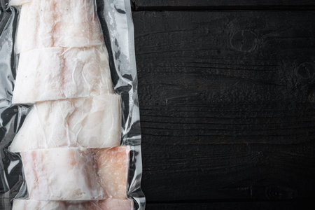 Raw haddock fish skinless plastic vacuum packaged, top view with copy space for text