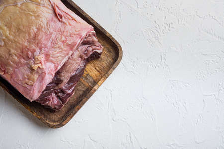 Striploin steak raw beef butchery cut, on white background, top view, with copy space for textの写真素材