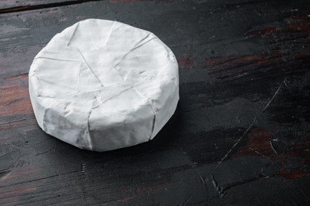 Farm cheese camembert set, on old wooden table with copy space for textの写真素材